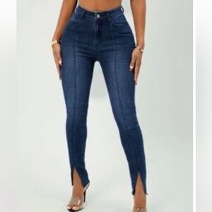 Dark blue jeans with open bottom